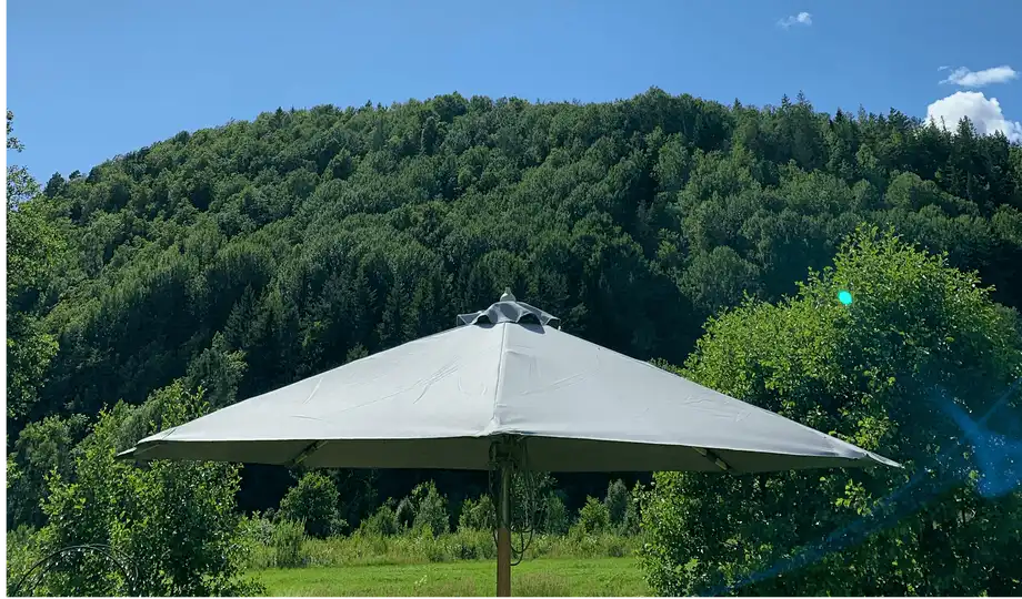 seating area with parasol with mountain view