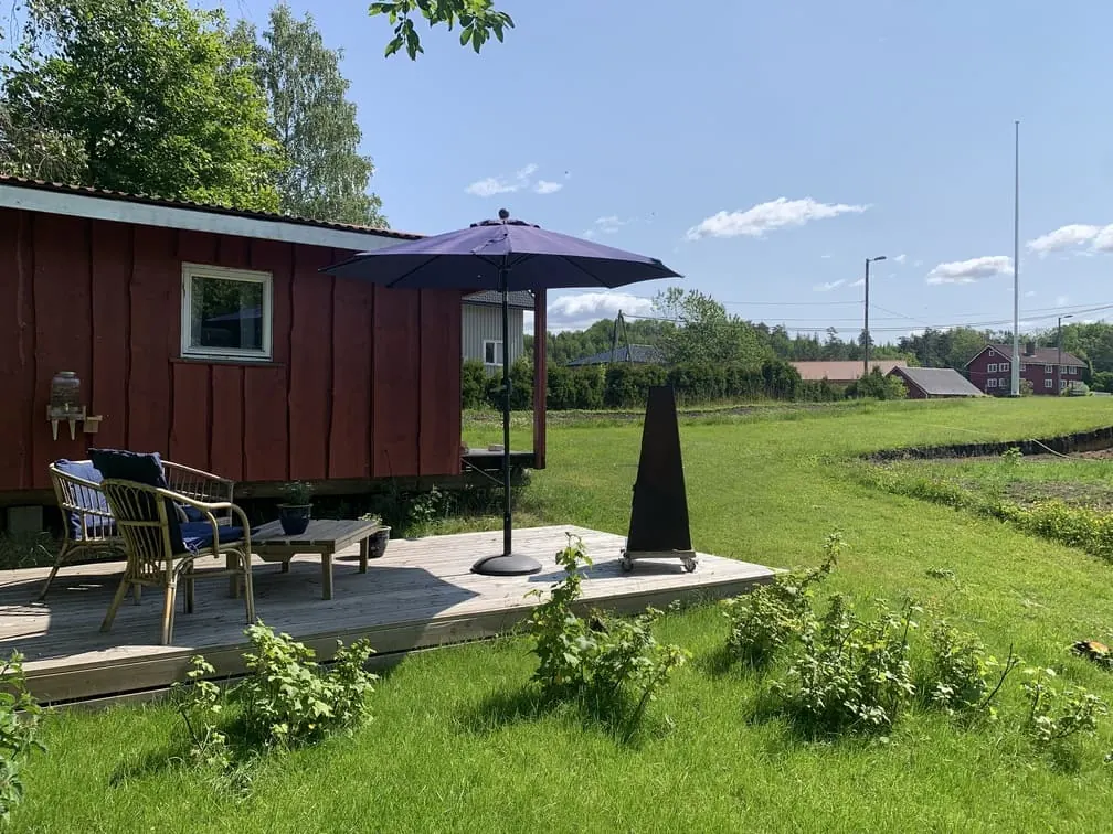 Cabin side view in countryside setting