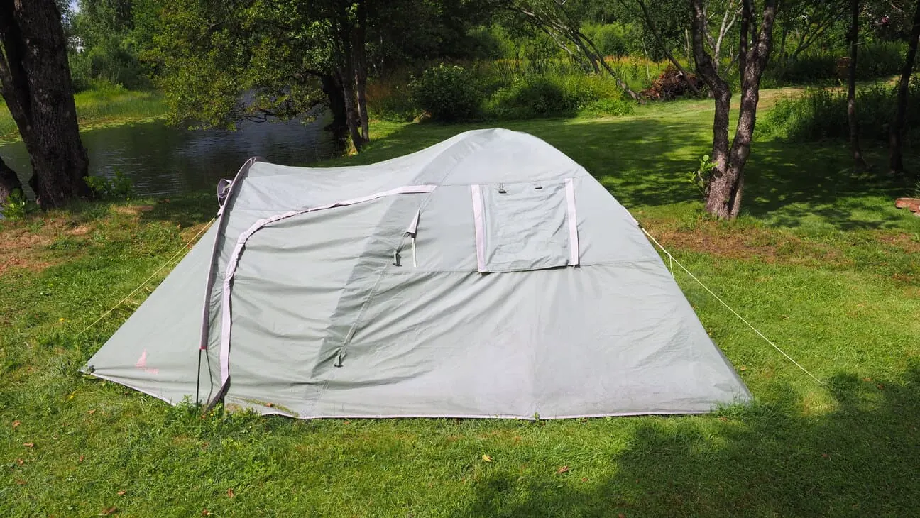 Tent near the river from side angle